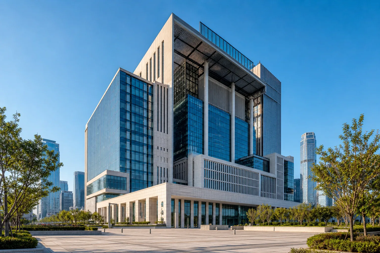 Large modern infrastructure building with glass and stone facade